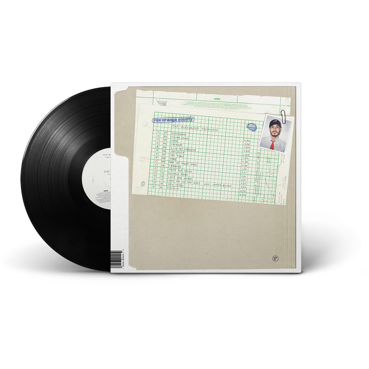 A vinyl record partially pulled from its sleeve. The sleeve features a beige cover with a green grid document and a small portrait photo in the top right corner.